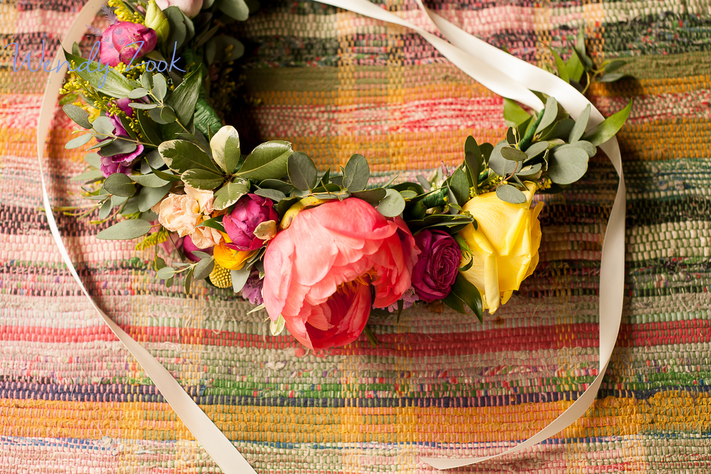 large-floral-crown-overhead-shot-on-rug-with-ribbon.jpg