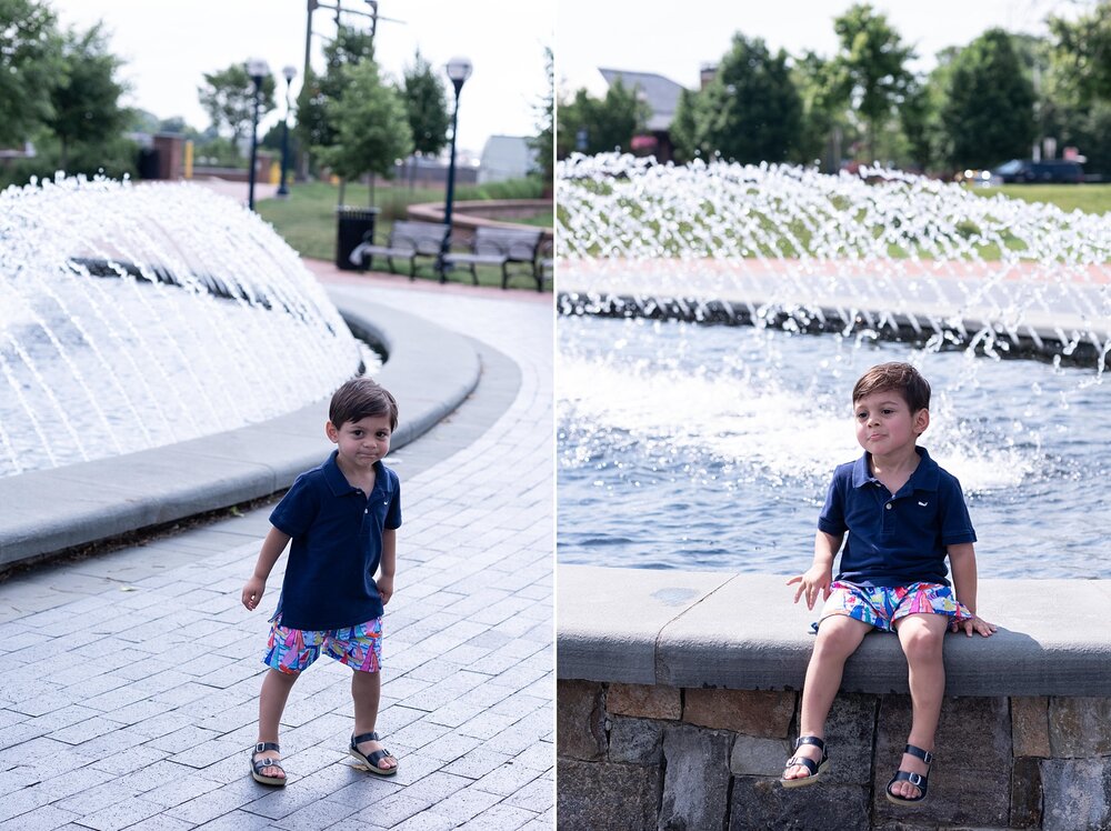 Wendy Zook photographs toddler boy by fountain in Frederick MD
