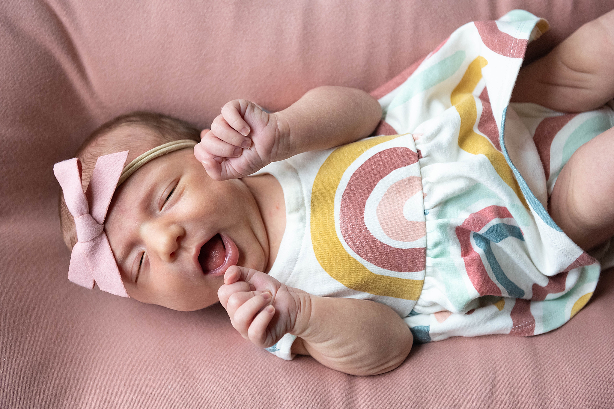 baby sleeps on couch during Washington DC Lifestyle Newborn session