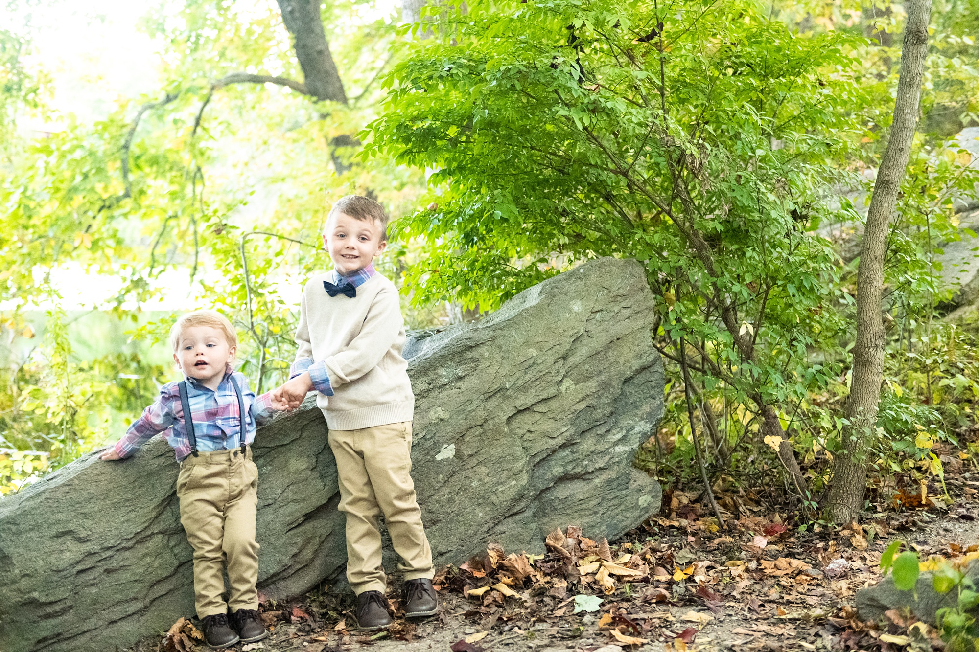 brothers explore on path during MD family photo session