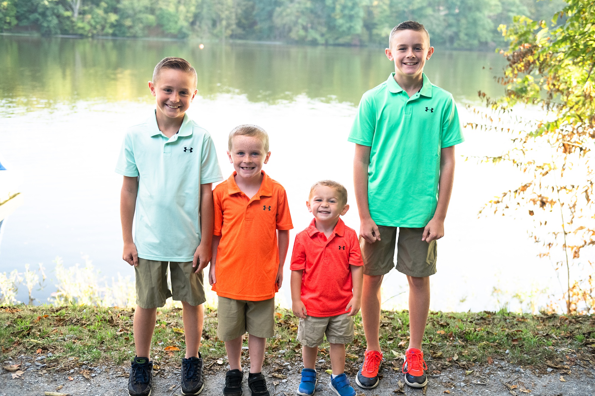 Boys pose together by Lake Linganore