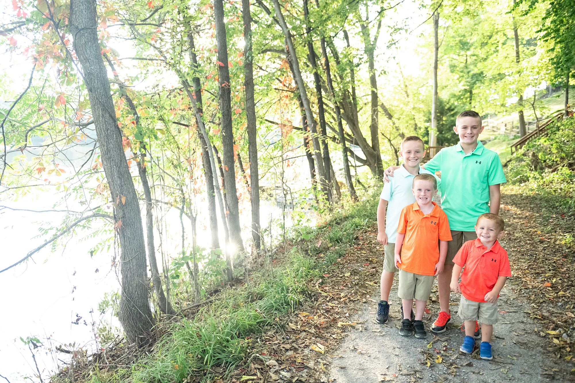boys pose together on trail in Lake Linganore