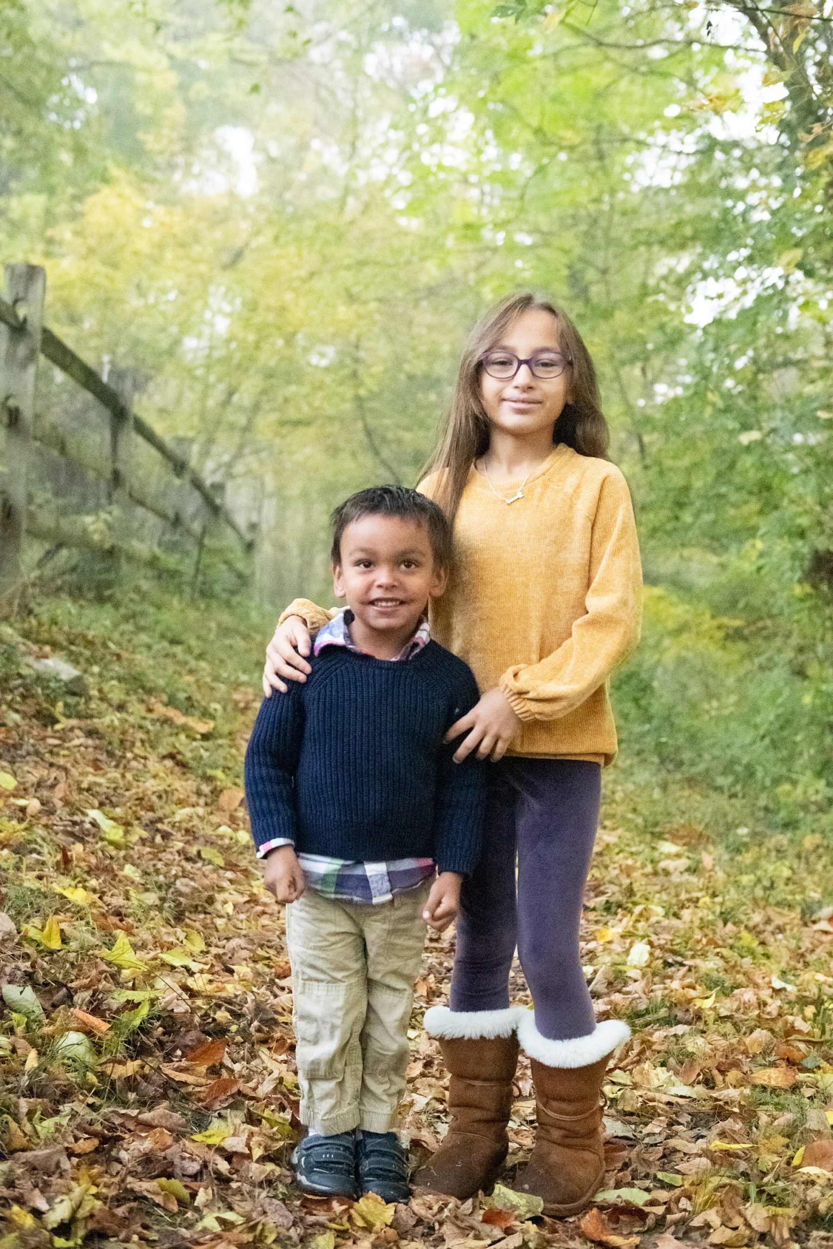 brother and sister pose together during Frederick MD family photos