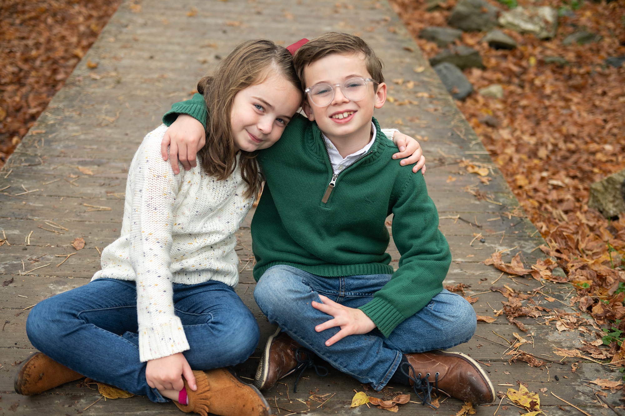 portrait of siblings hugging during Family Photo Session in Frederick County