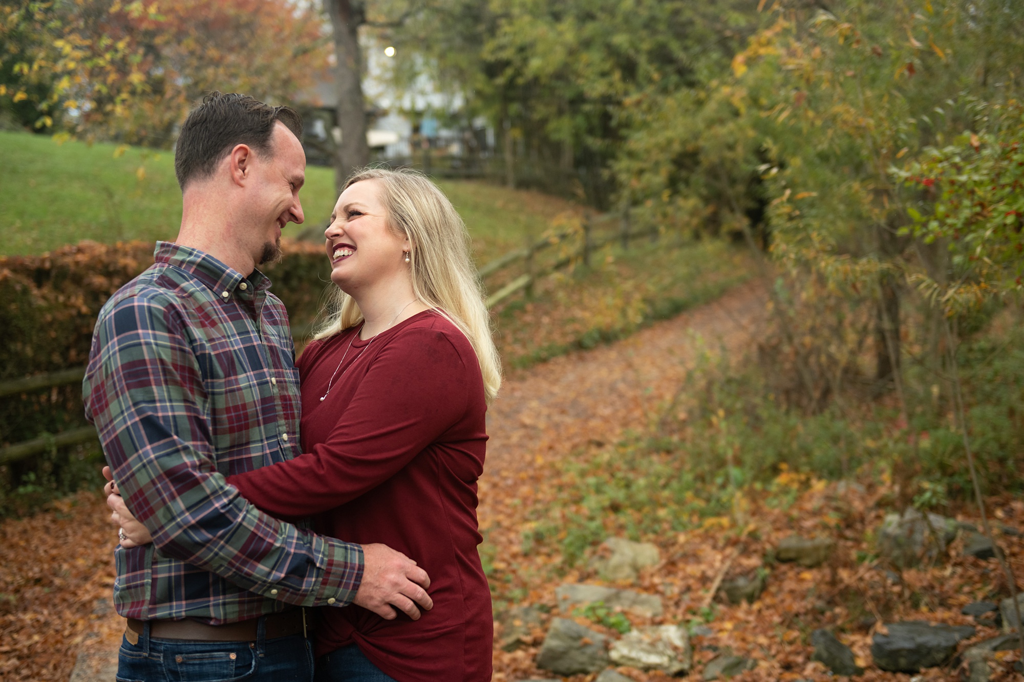 husband and wife pose together during Family Photo Session in Frederick Co