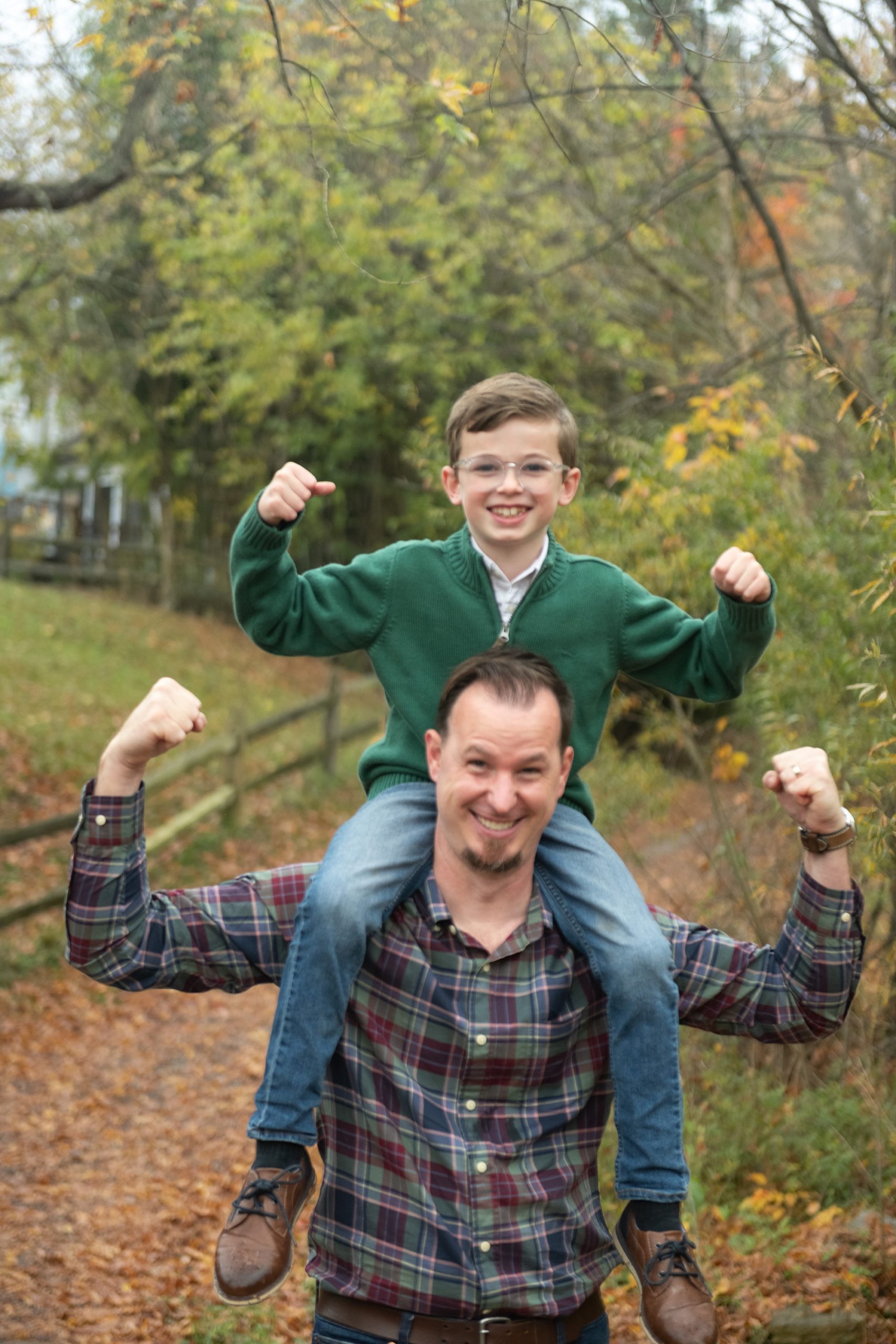 son and dad make silly face during Family Photo Session in Frederick County 
